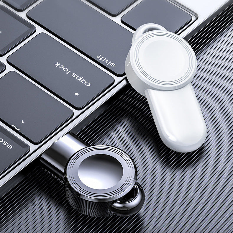 Wireless charging device on a laptop keyboard with text 'Wireless charging Endurance' and 'Portable watch wireless charger'.