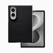 A black aramid fiber case is shown on a folded phone next to an open device with a grey screen.
